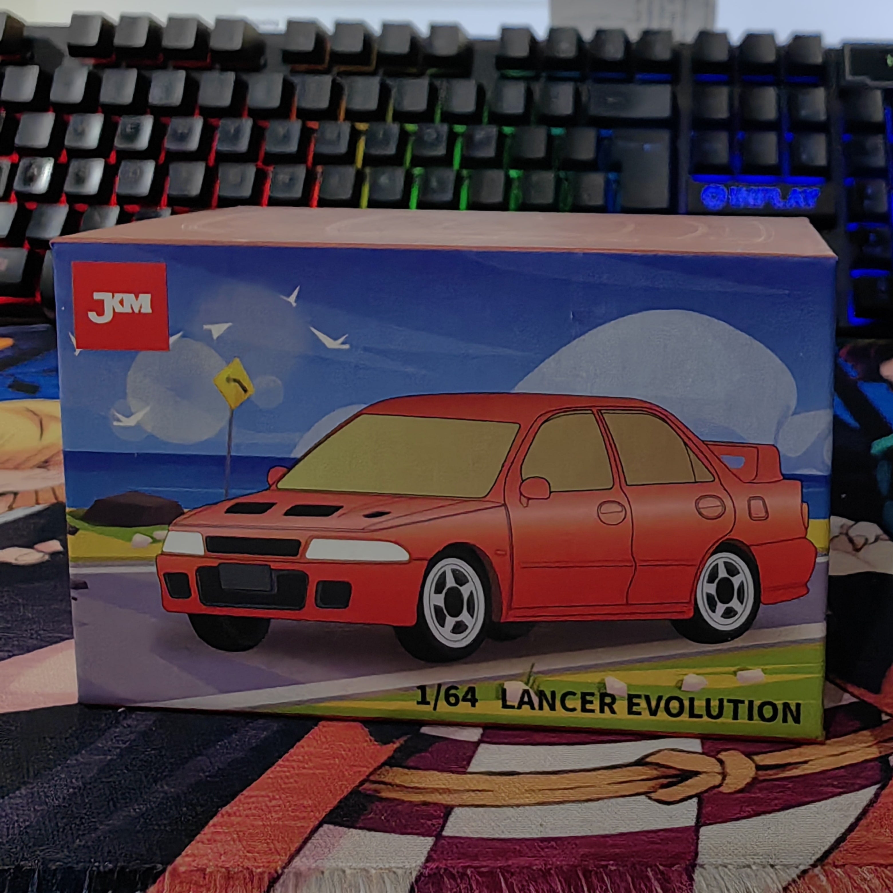 JKM 1:64 LANCER EVOLUTION RED BNY164030325035