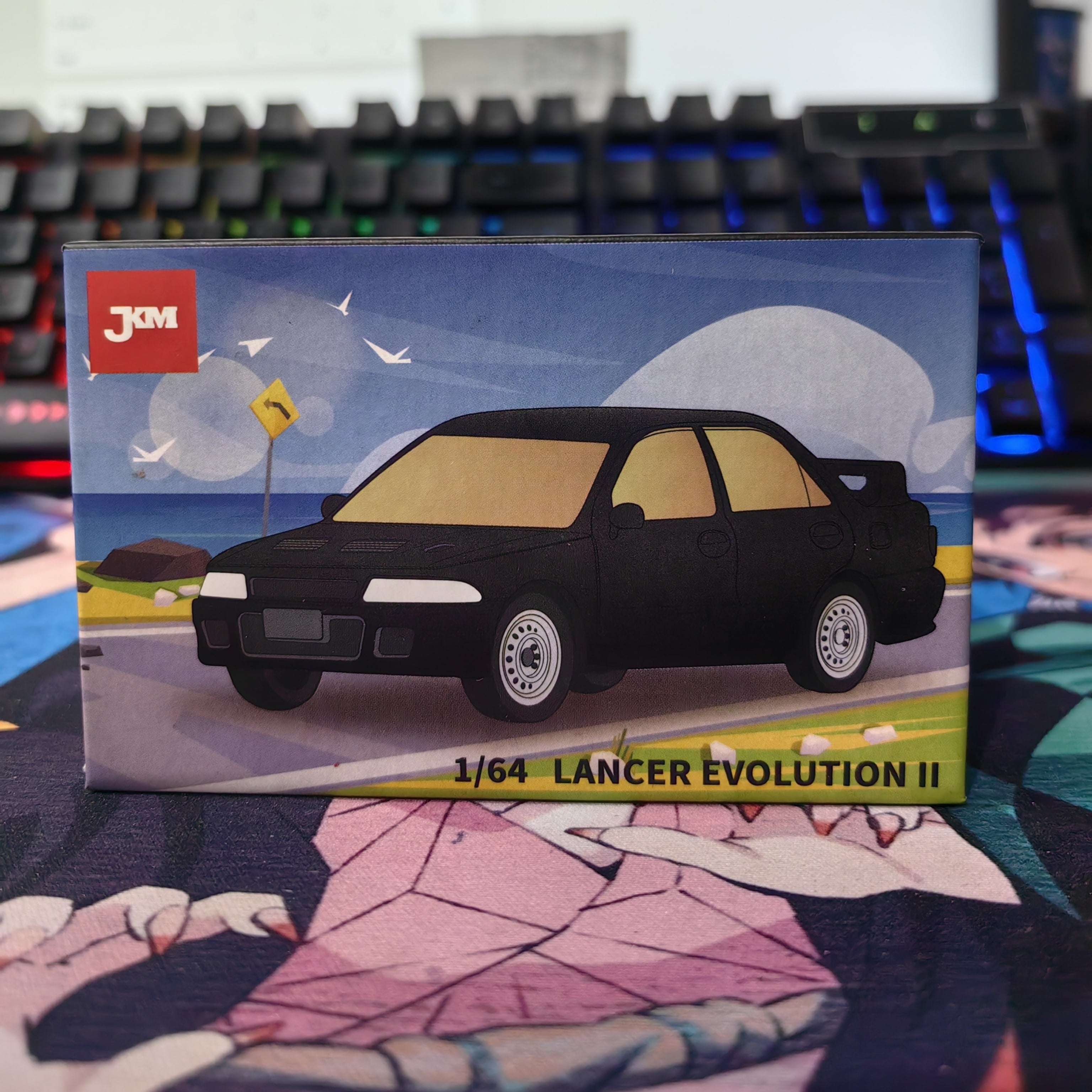 JKM 1:64 LANCER EVOLUTION II BLACK BNYJKM07292504